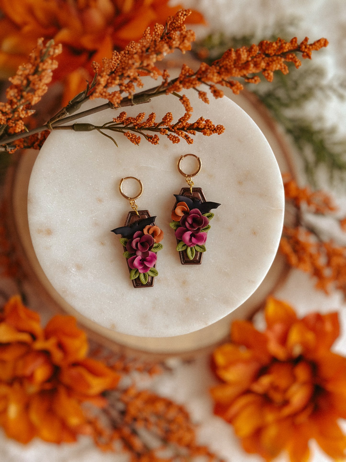 Autumn floral coffin bat polymer clay drop earrings fall spooky jewelry