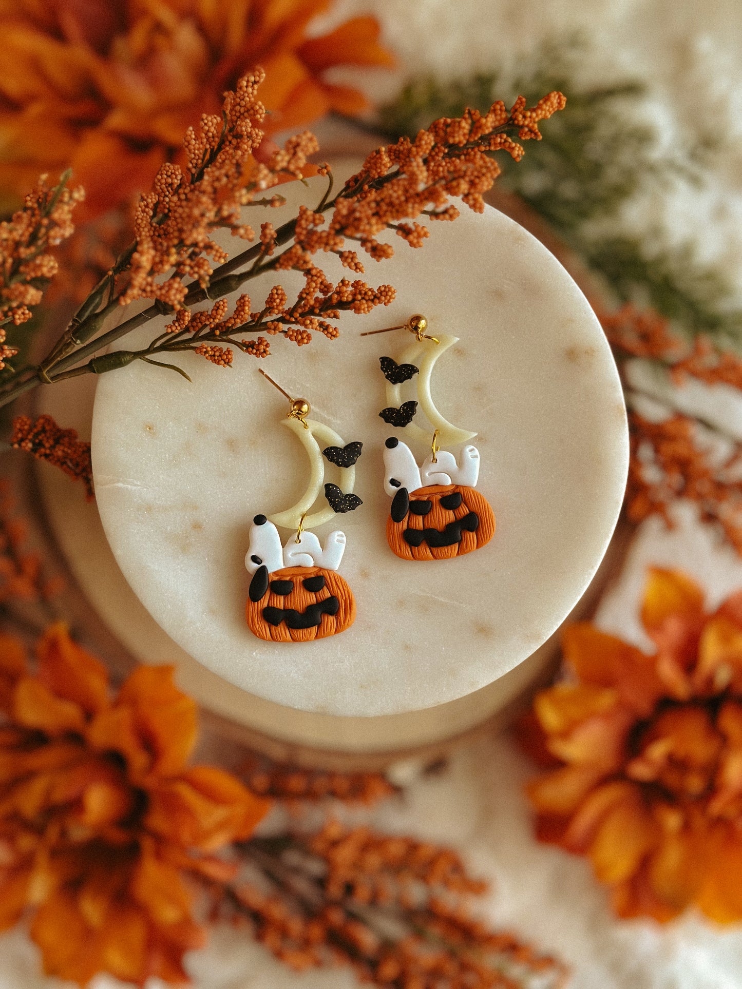 Snoopy Great Pumpkin Moon Dangles polymer clay earrings with Snoopy on pumpkin moon motif