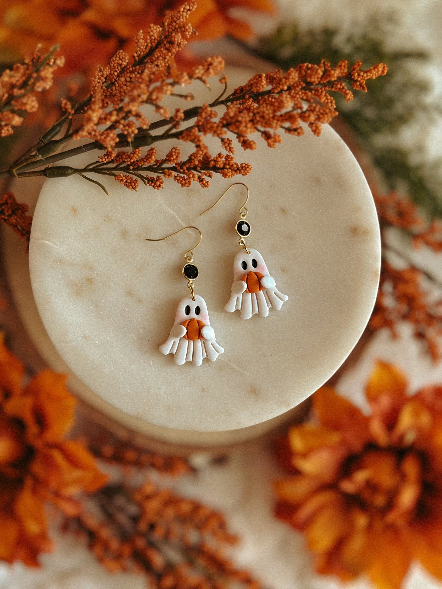Ghostie holding pumpkin polymer clay dangle earrings for Halloween