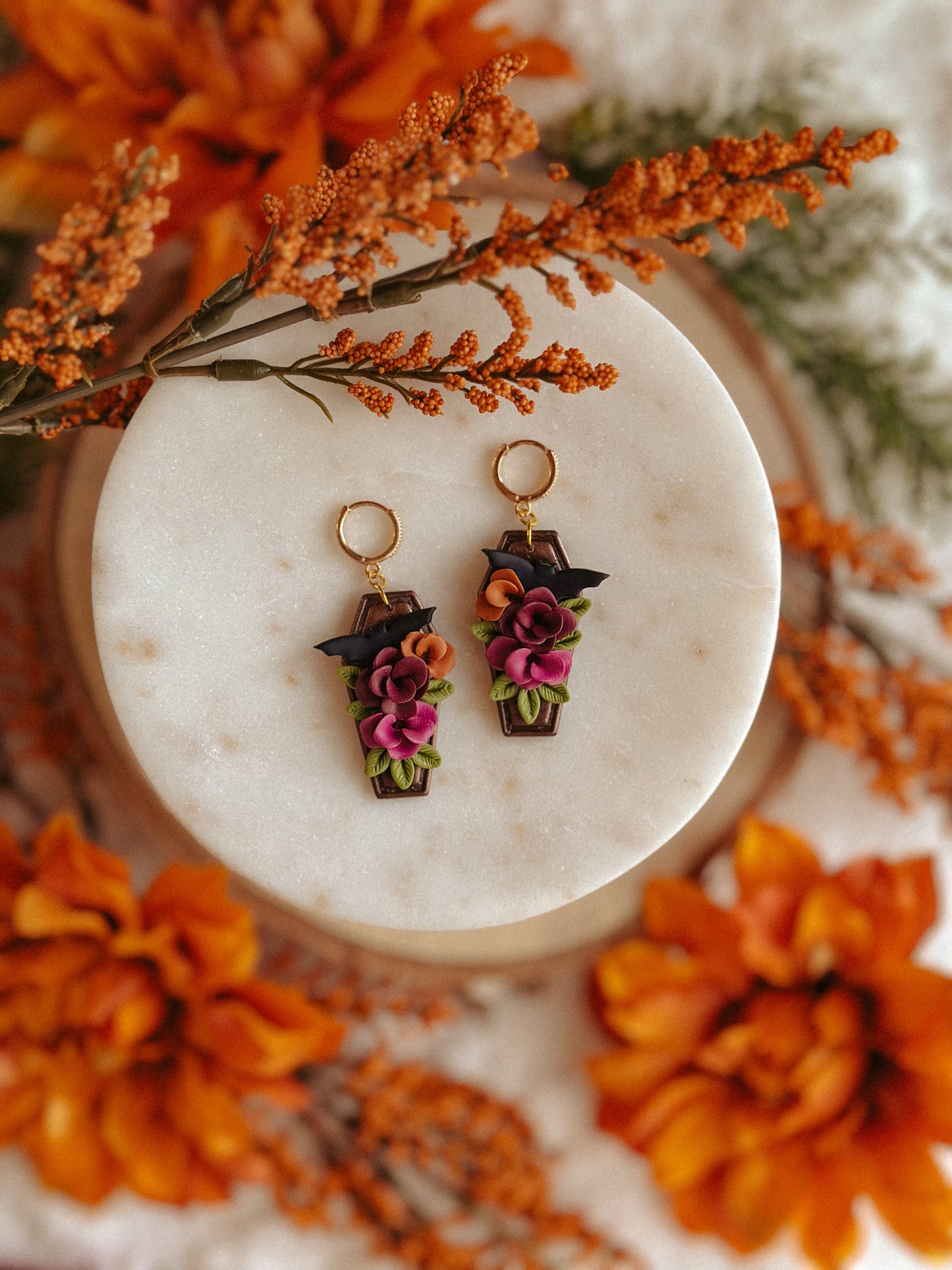 Autumn floral coffin bat polymer clay drop earrings fall spooky jewelry