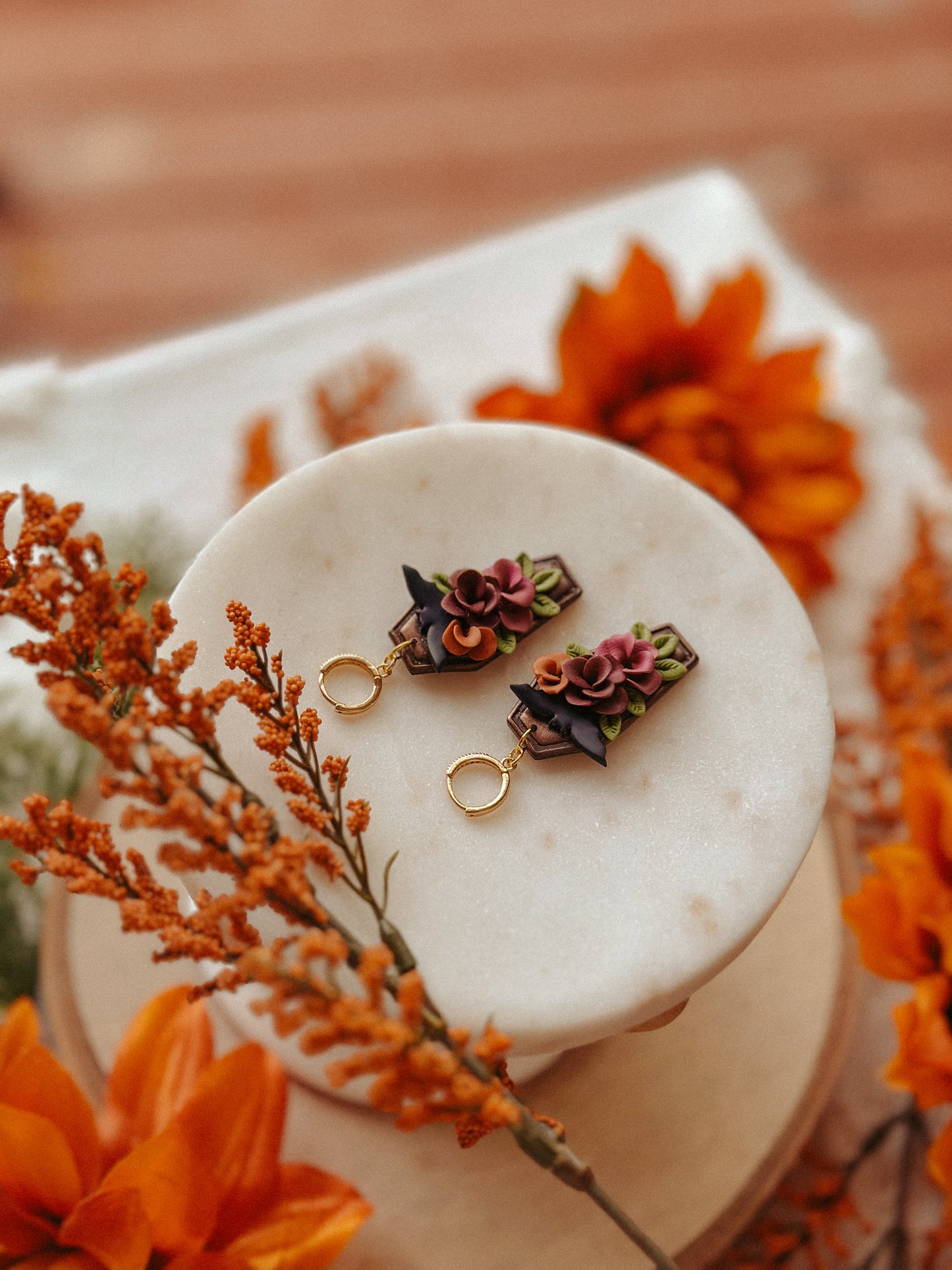 Autumn floral coffin bat polymer clay drop earrings fall spooky jewelry