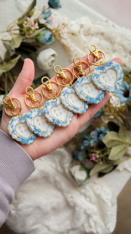 Handcrafted Chinoiserie FCK ICE Heart Keychain in polymer clay with bold heart design and metal keyring on white background — unique handmade accessory