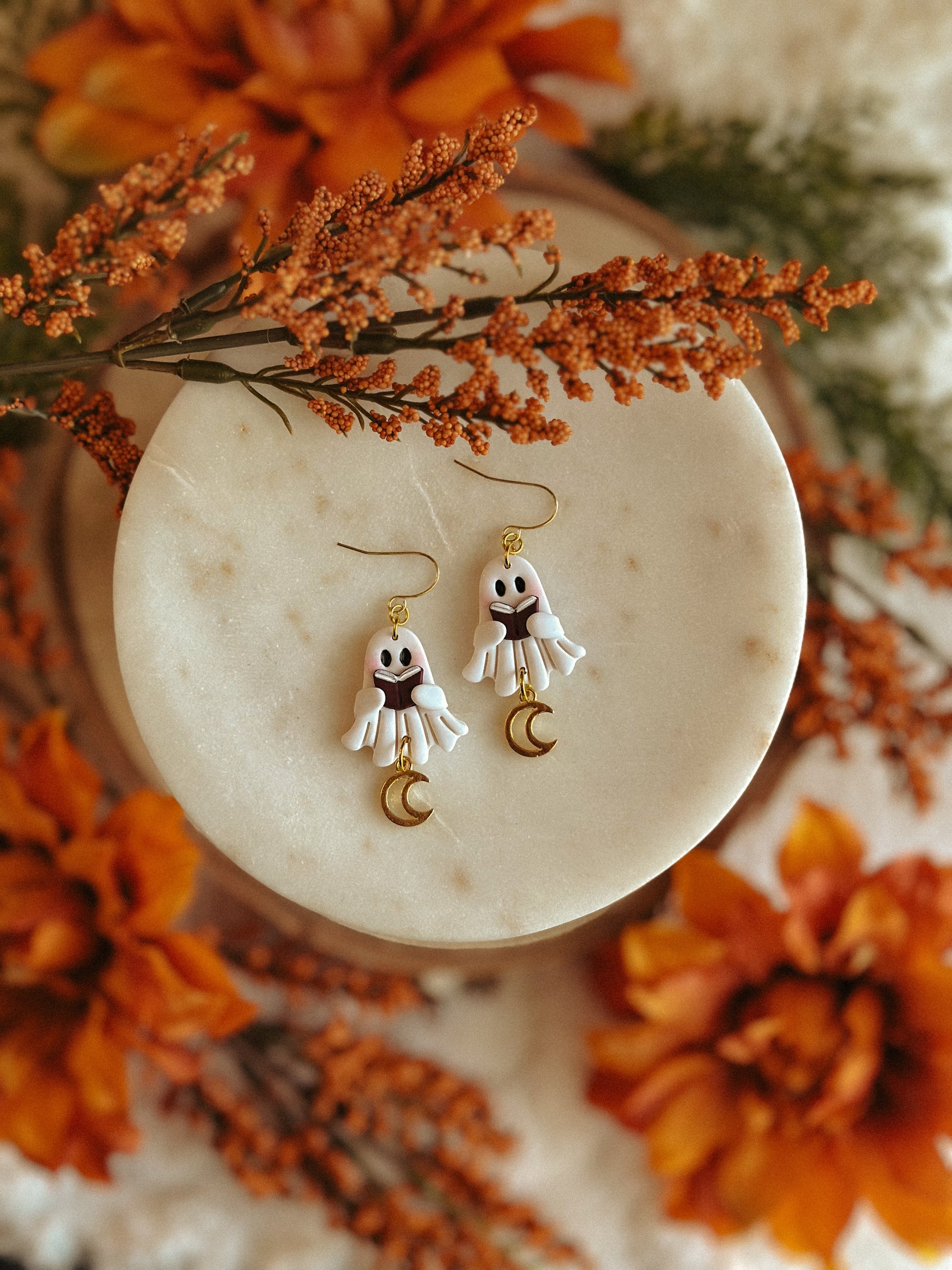 Handmade Halloween polymer clay ghost earrings reading a book motif
