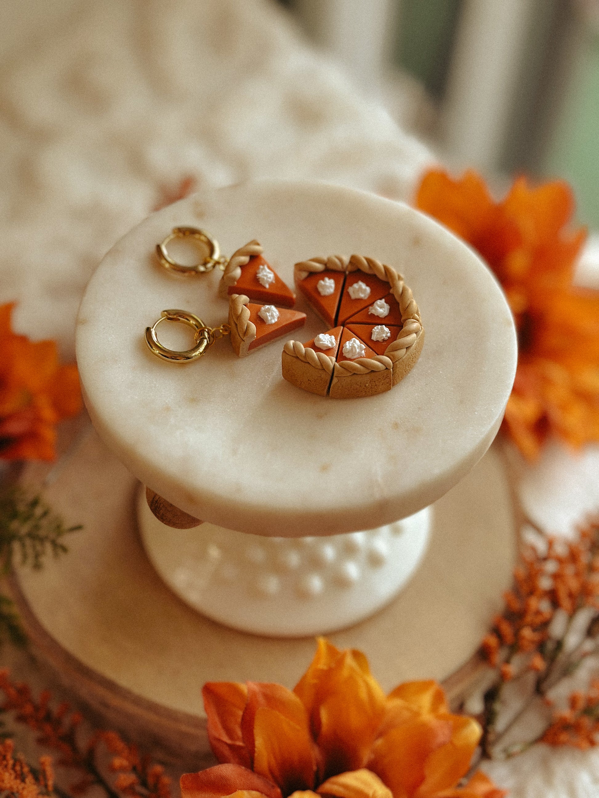 Pumpkin Pie Slice Huggies polymer clay earrings in handmade orange pie design, autumn and fall jewelry