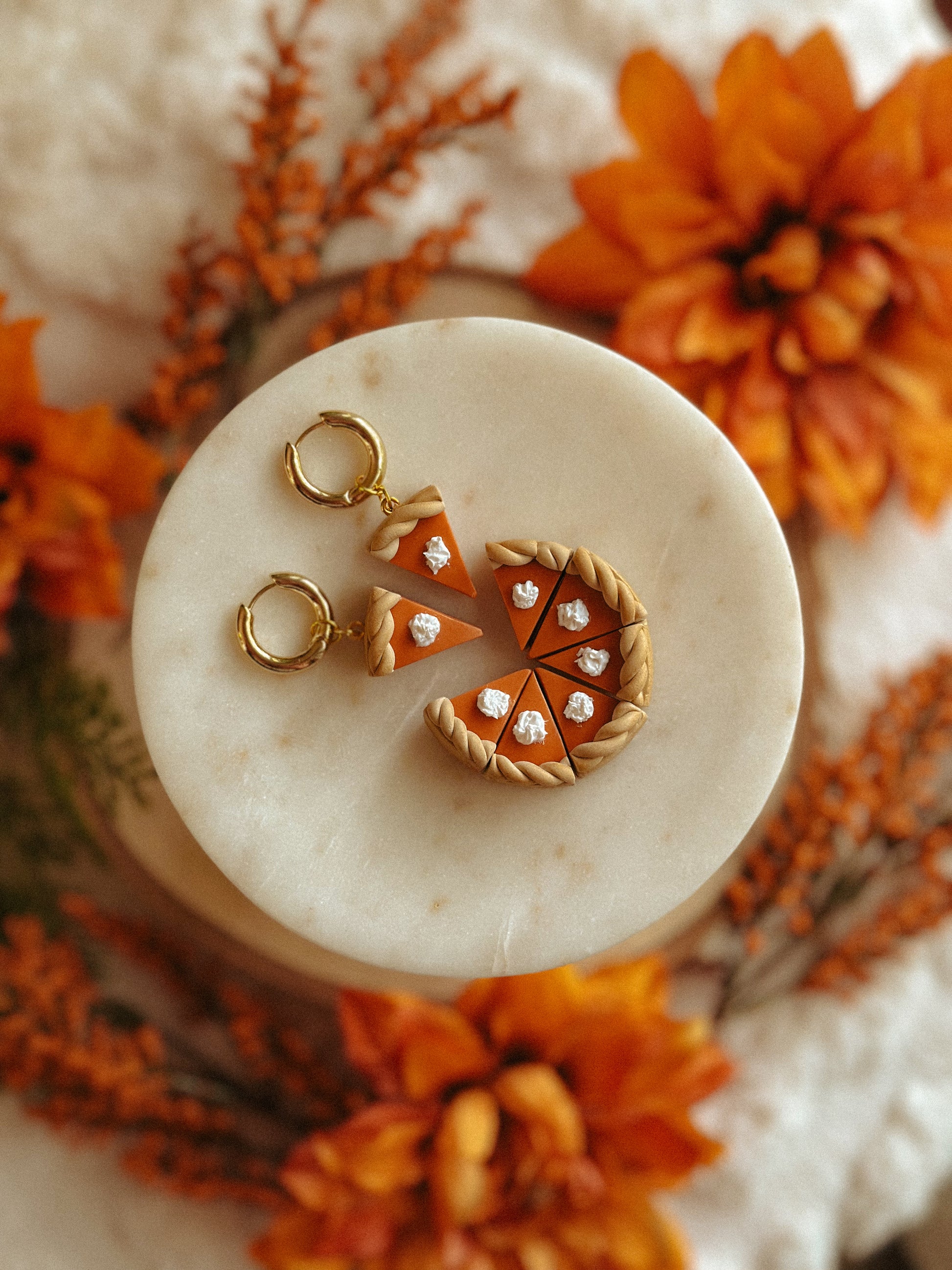 Pumpkin Pie Slice Huggies polymer clay earrings in handmade orange pie design, autumn and fall jewelry