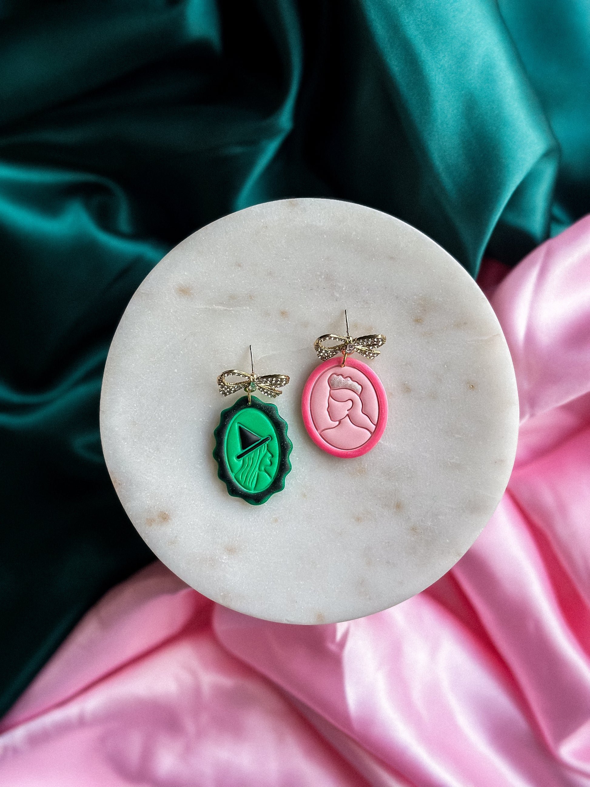 Glinda + Elphaba portrait earrings pink and green handmade polymer clay dangle earrings Wicked inspired earrings
