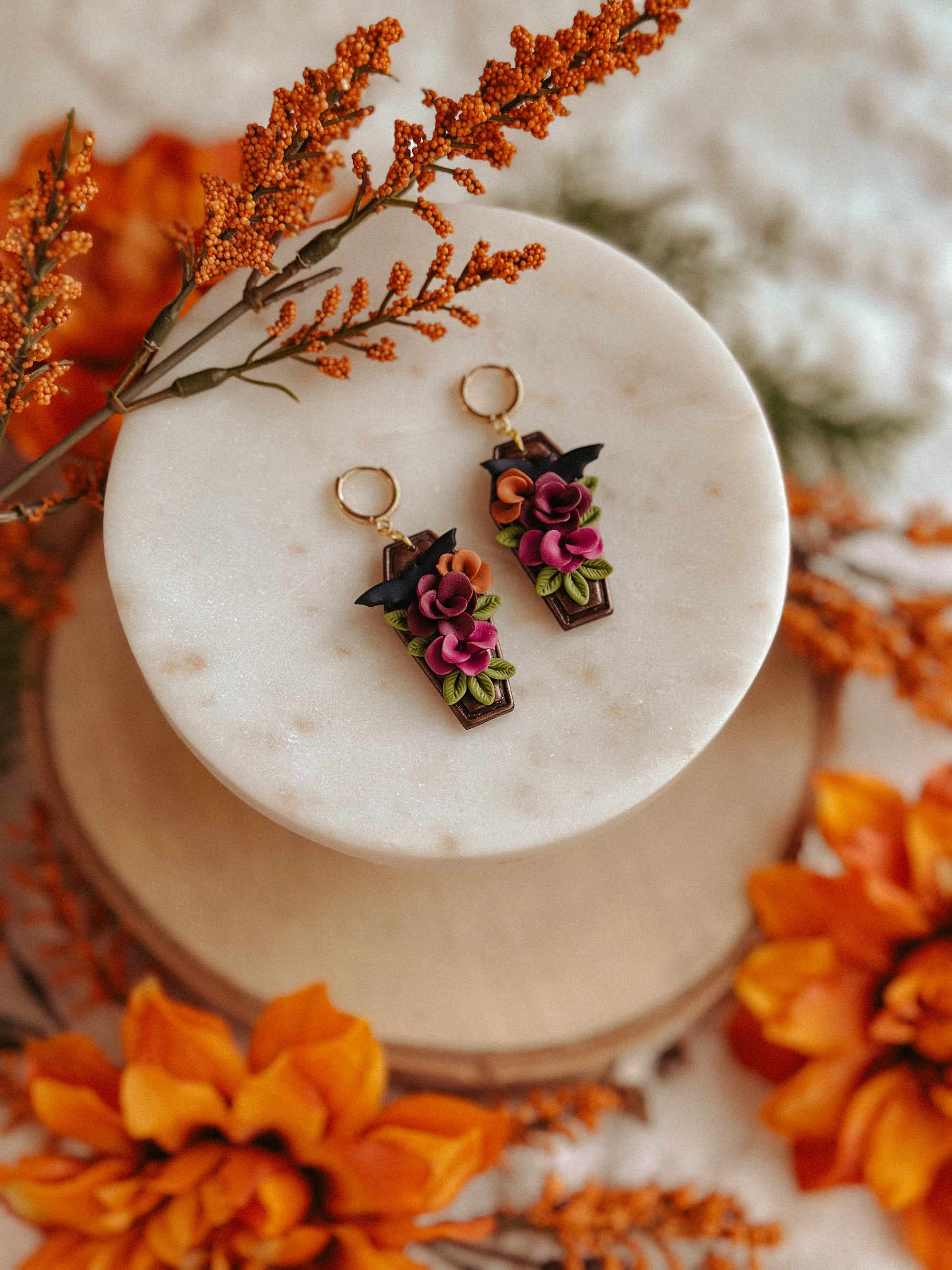 Autumn floral coffin bat polymer clay drop earrings fall spooky jewelry