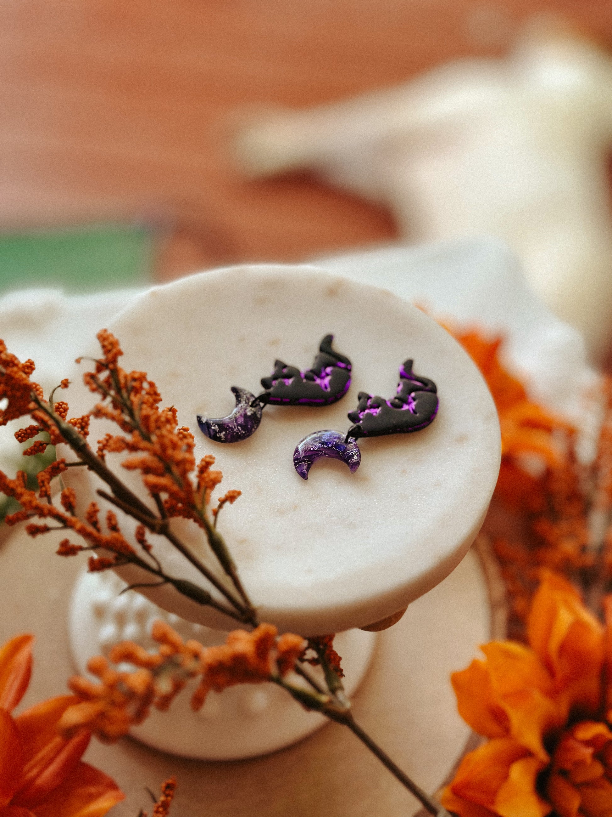 Salem Cat Hanging from the Moon polymer clay earrings black cat and crescent moon design