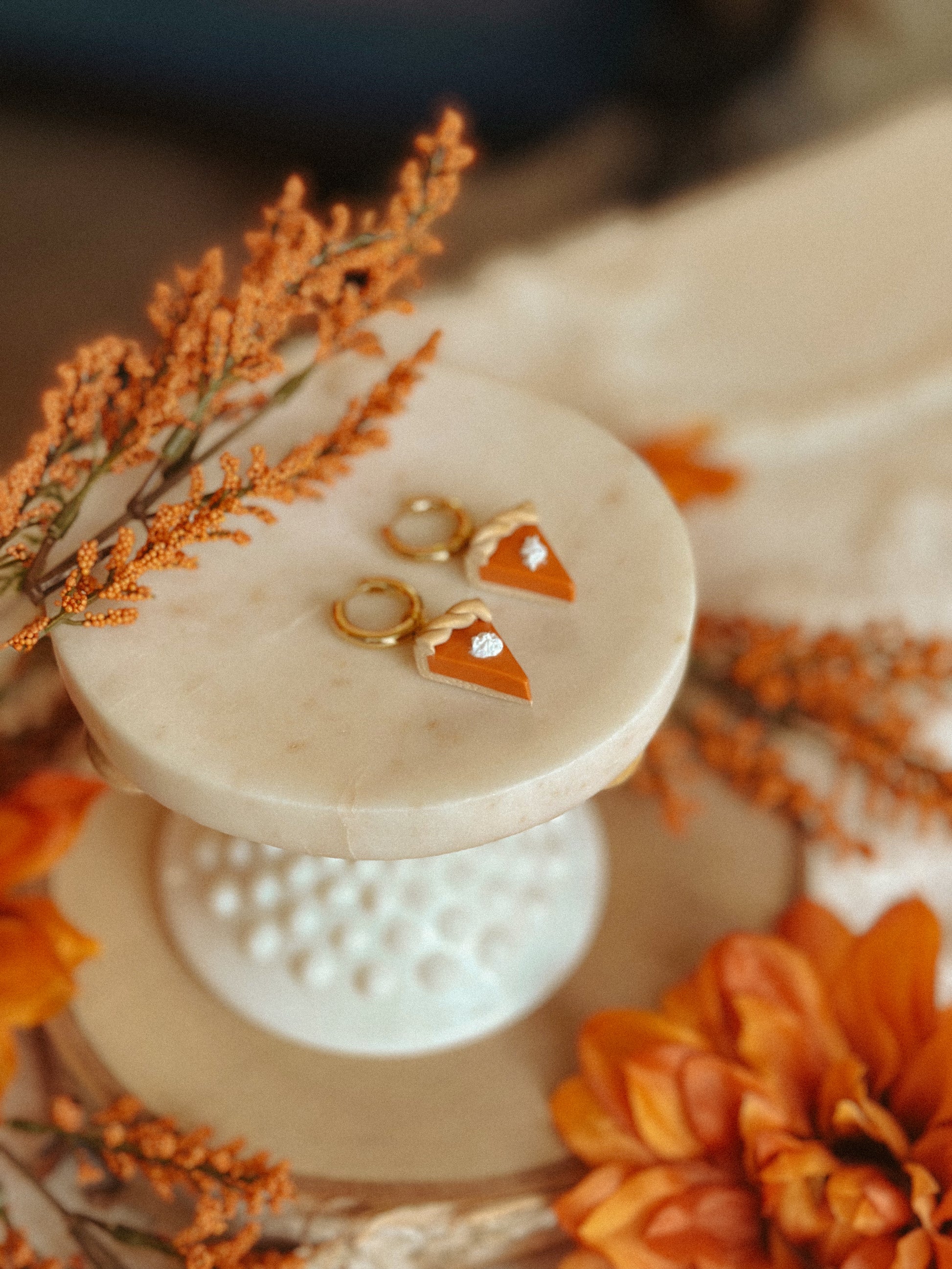 Pumpkin Pie Slice Huggies polymer clay earrings in handmade orange pie design, autumn and fall jewelry