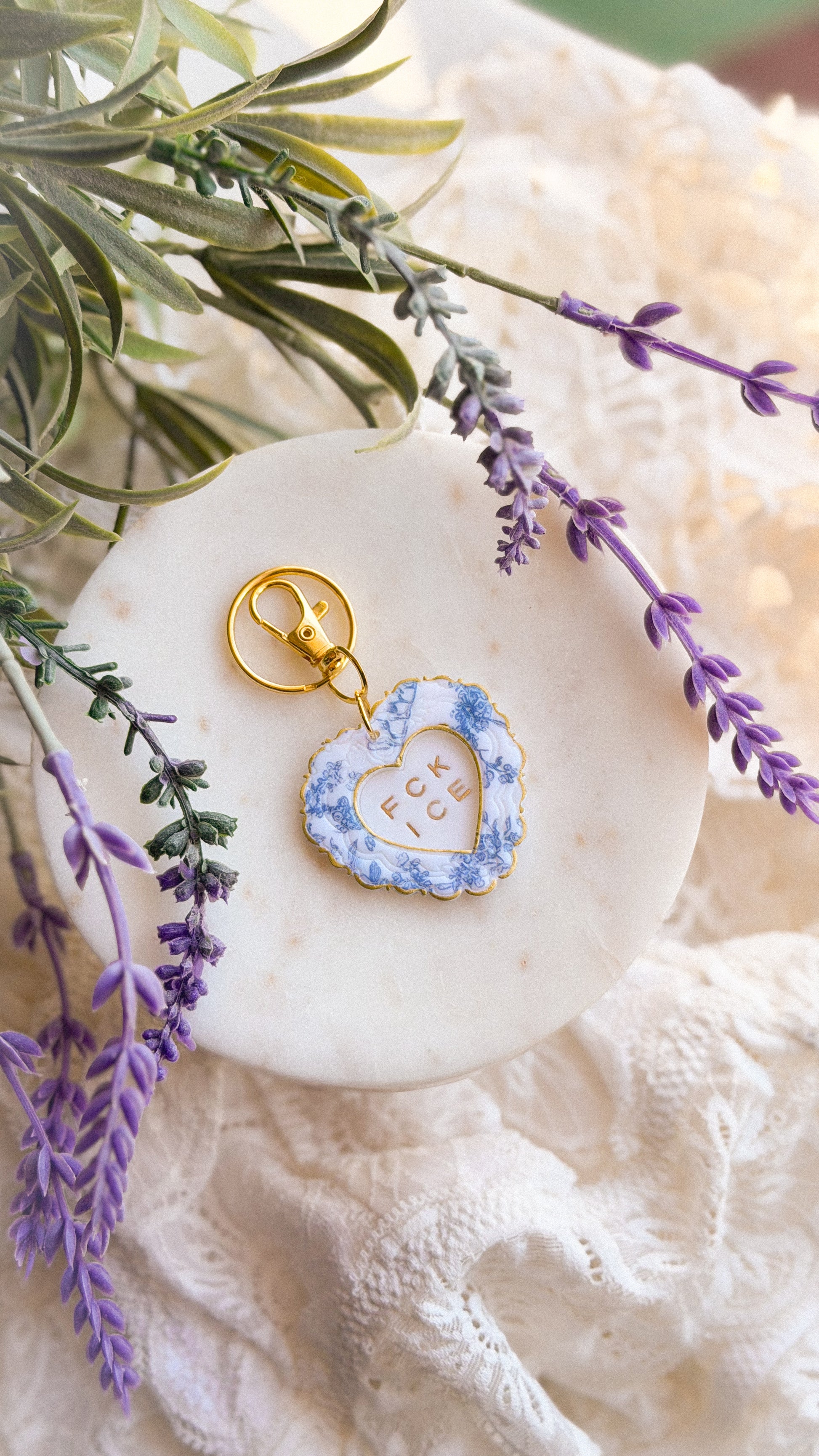 Handcrafted Chinoiserie FCK ICE Heart Keychain in polymer clay with bold heart design and metal keyring on white background — unique handmade accessory